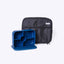 Blue silicone bento box and black lunch bag on a white background