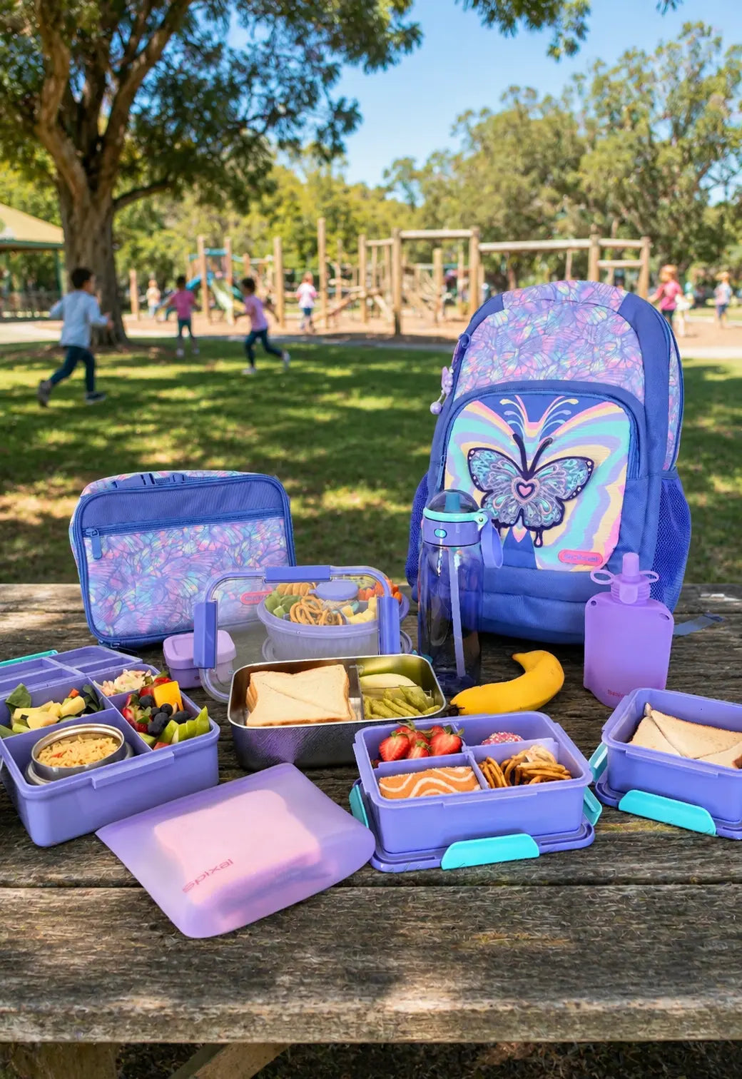 Butterfly backpack with matching lunch bag and matching lunchware, bento boxes, reusable yoghurt pouches and reusable snack bags