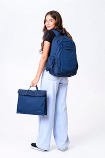 Large blue Axis school bag and homework folder carried by school girl matching set | Spixal