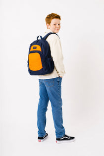 Large blue orange Axis school bag worn by teen school boy | Water bottle side pocket laptop sleeve | Spixal