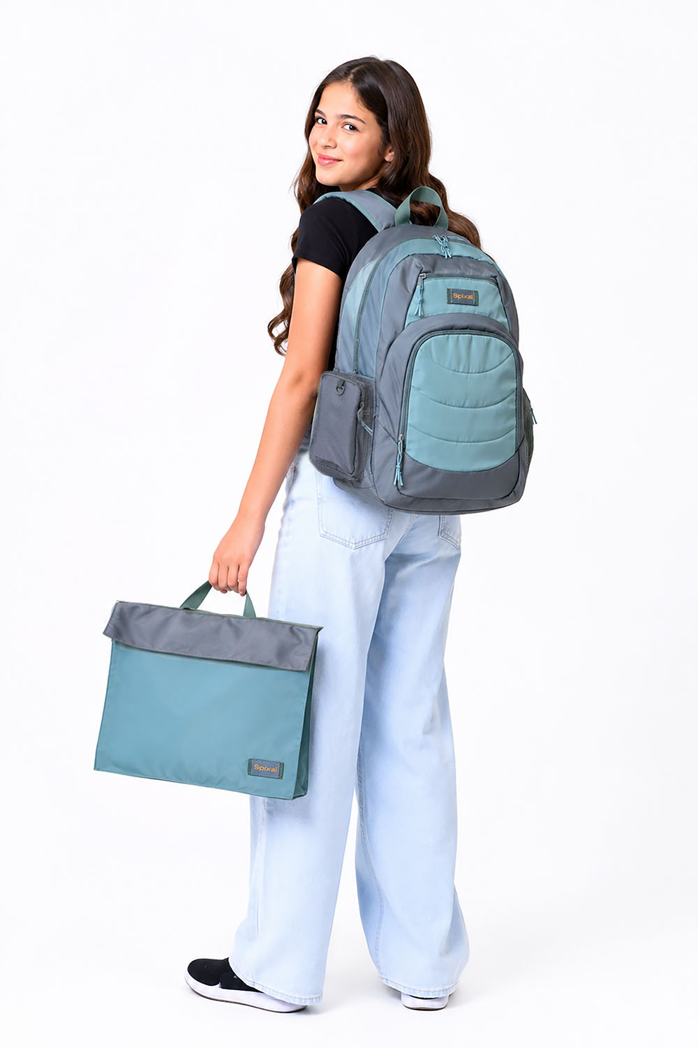 Large green grey Axis school bag and homework folder carried by teen school girl matching set library bag | Spixal
