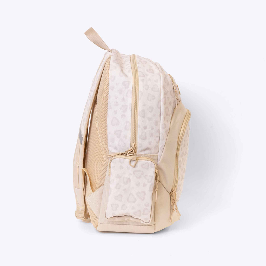 The Axis Backpack Leopard — lifestyle flat lay | Spixal