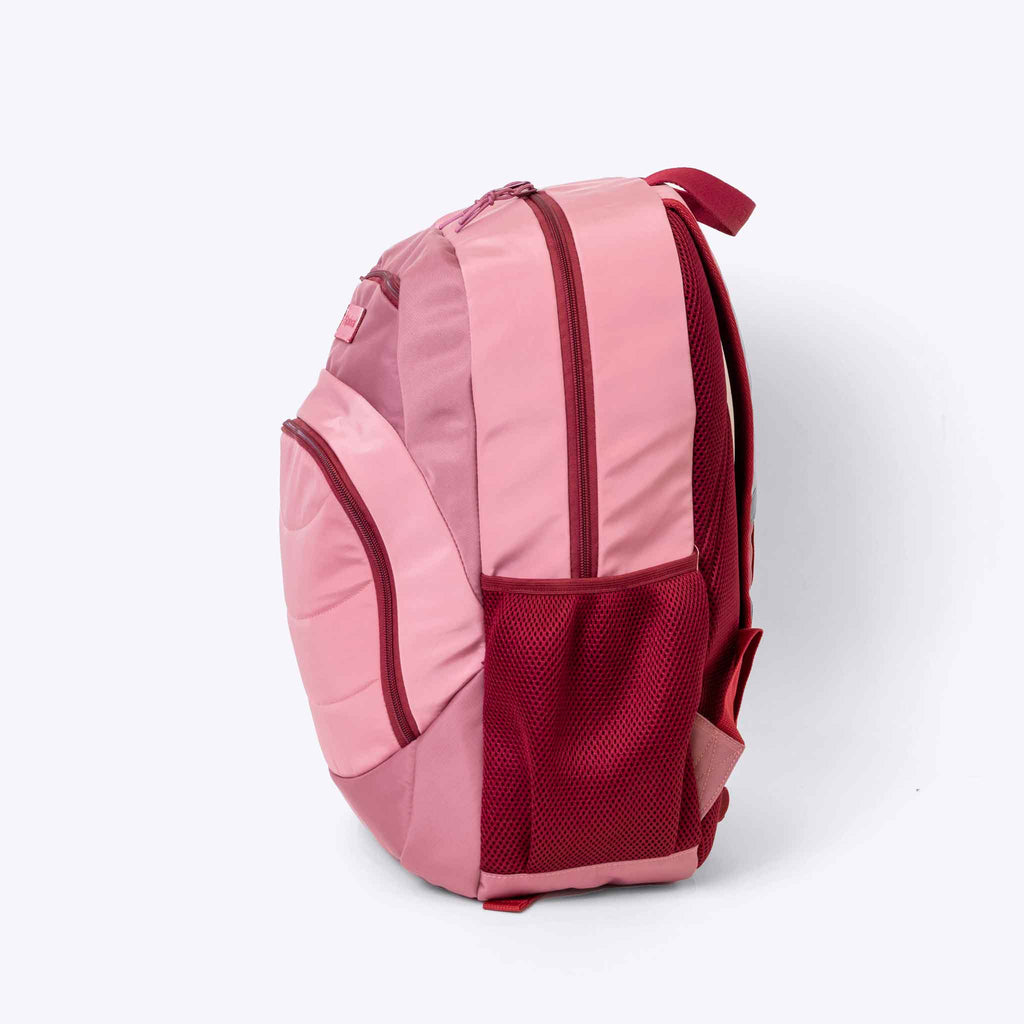 The Axis Backpack Pink — lifestyle flat lay | Spixal