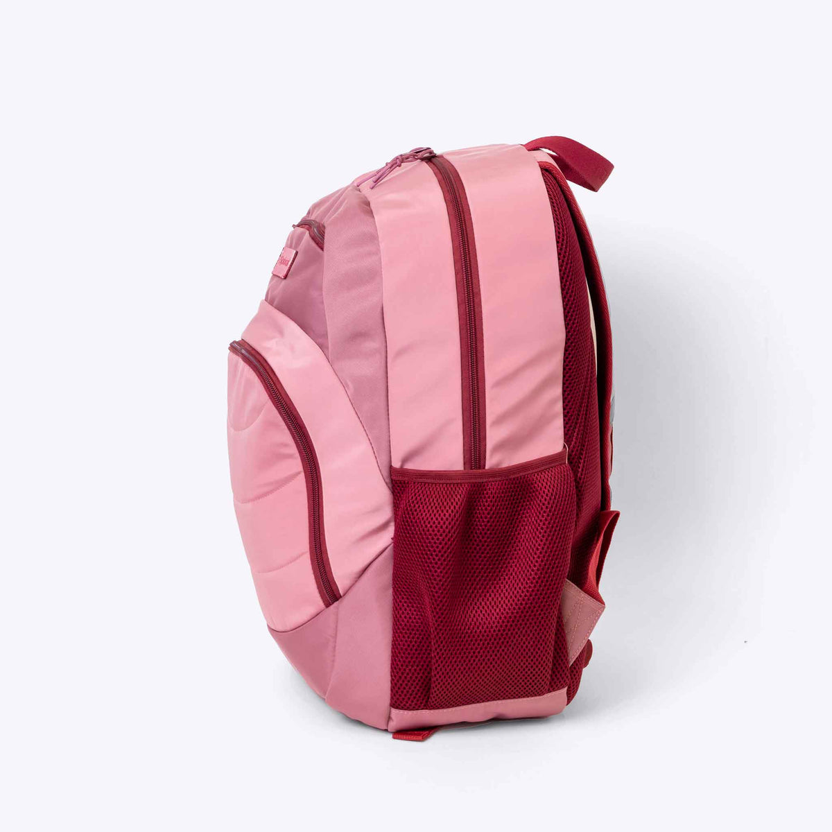 The Axis Backpack Pink — lifestyle flat lay | Spixal