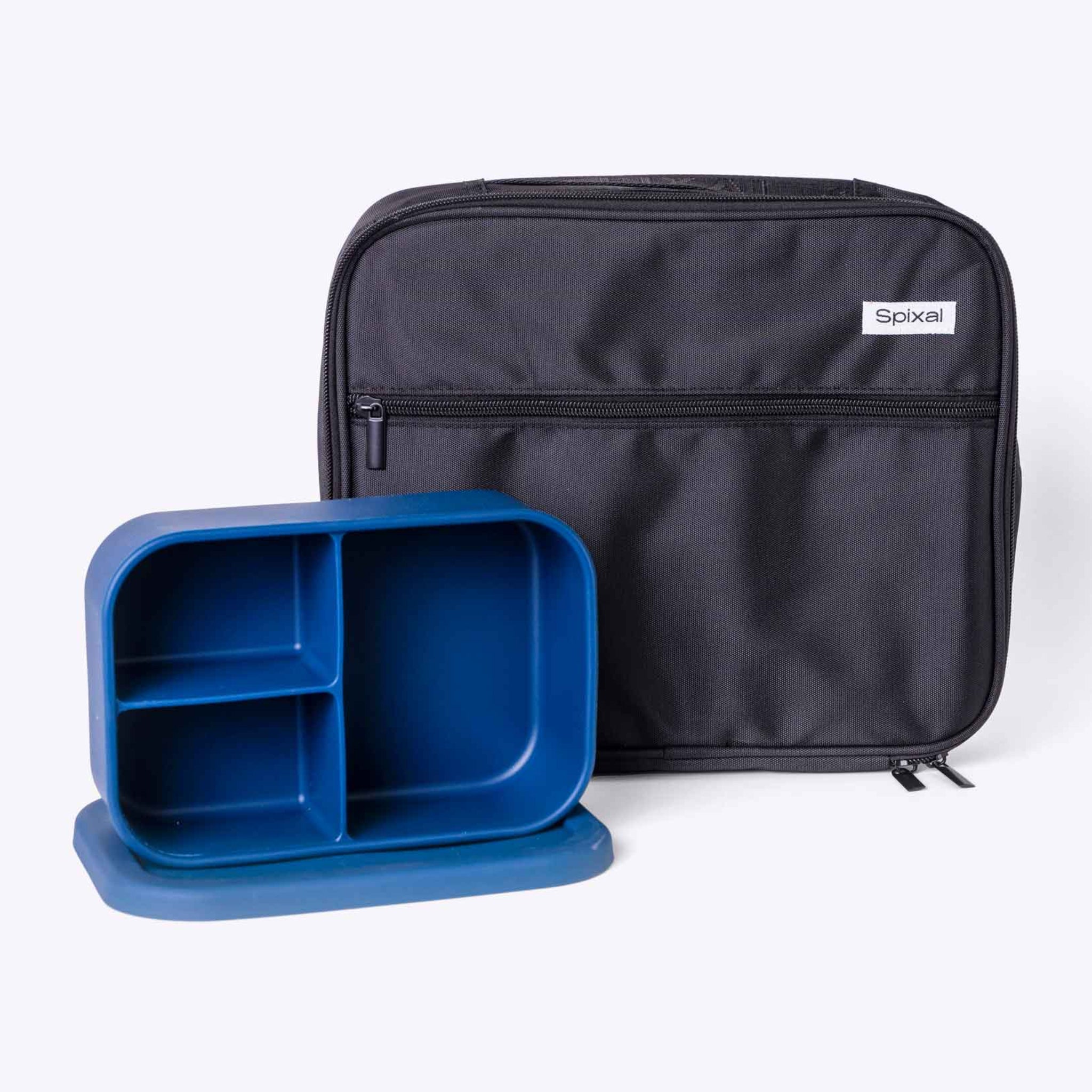 Black lunch bag and blue silicone bento box container on a white background