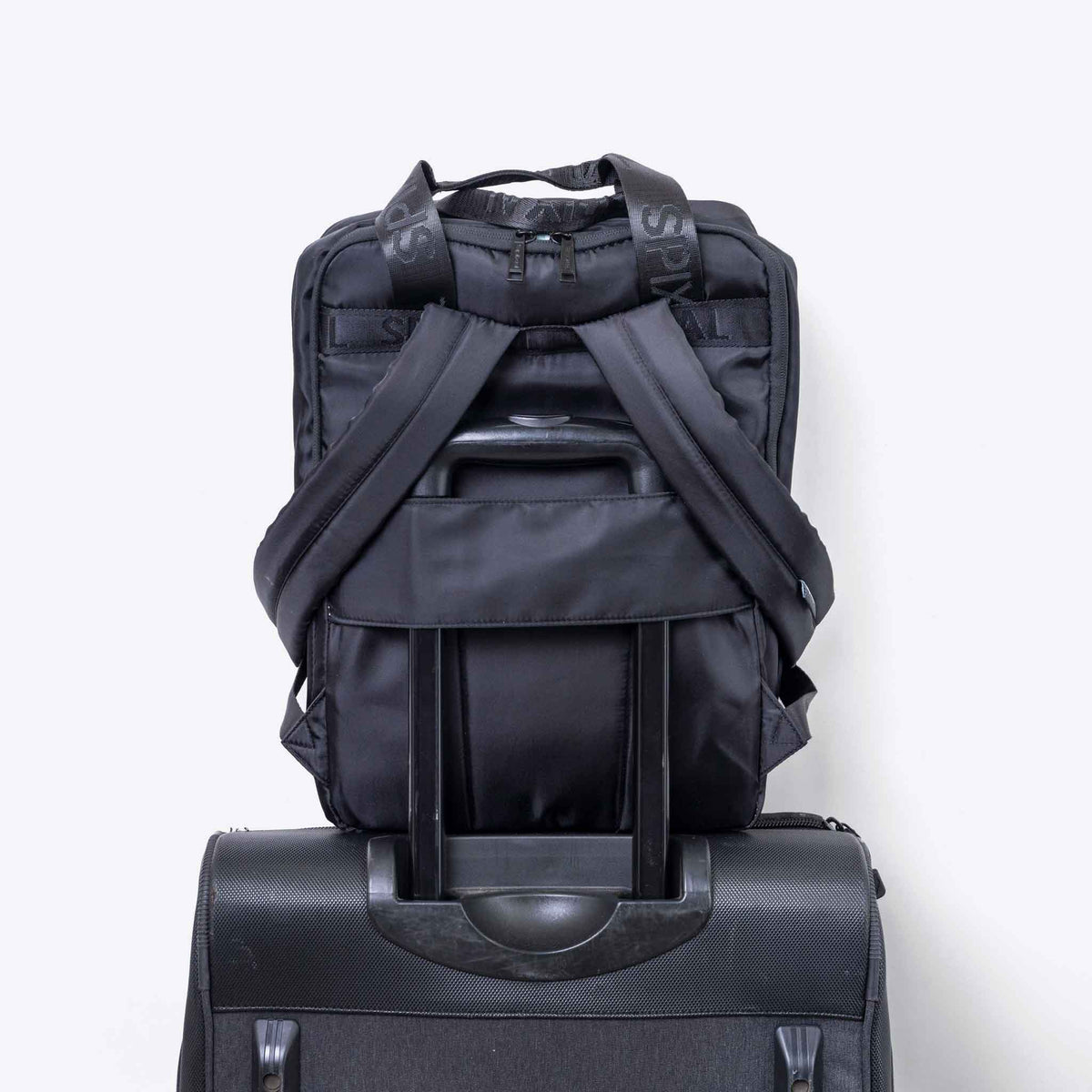 The Commute Series Backpack — styled lifestyle shot | Spixal