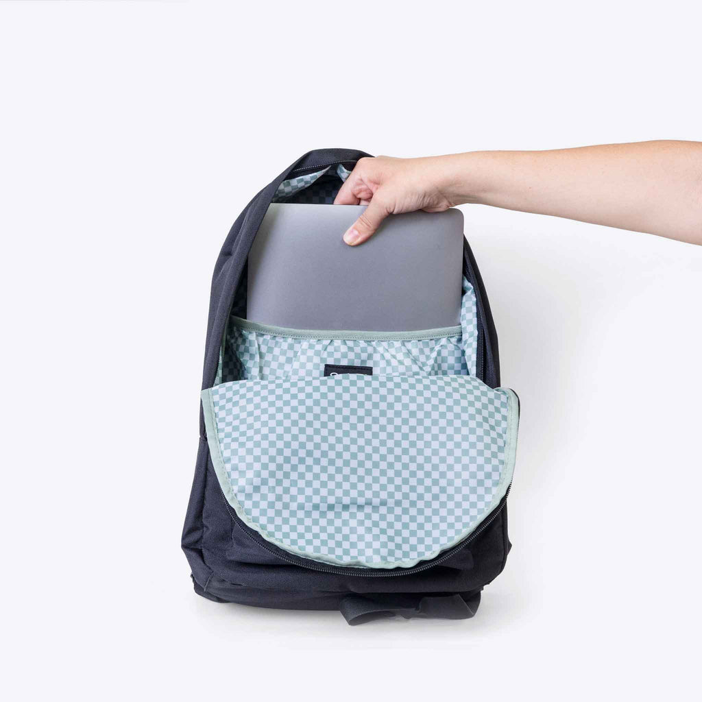 The Daily Backpack — lifestyle flat lay | Spixal