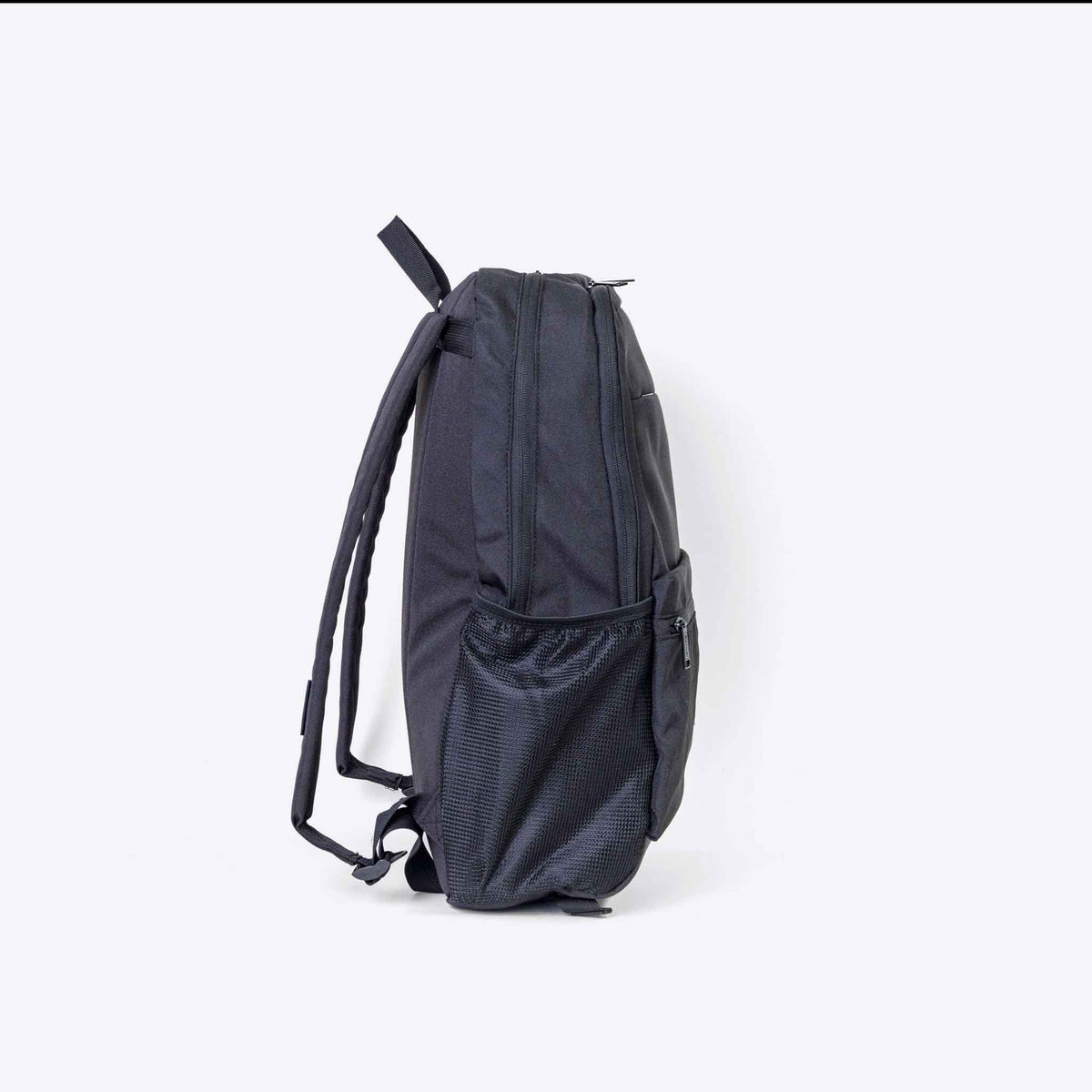 The Flex Backpack — styled lifestyle shot | Spixal