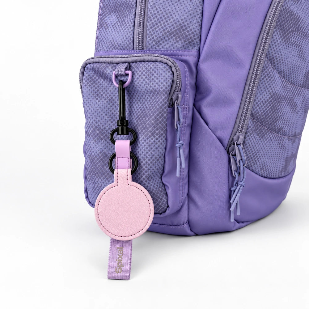 Purple Axis magnetic hat clip in lilac on a purple kids school backpack | Spixal